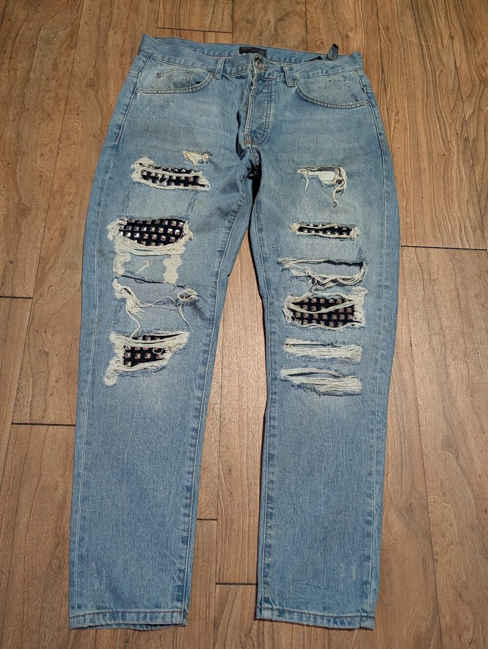 Zara Light Blue Ripped Jeans with Black Patch Accents